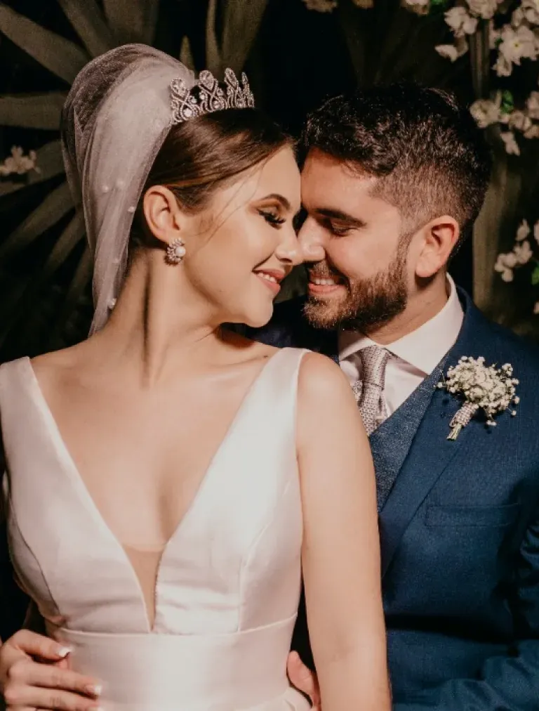 A couple at the end of the aisle